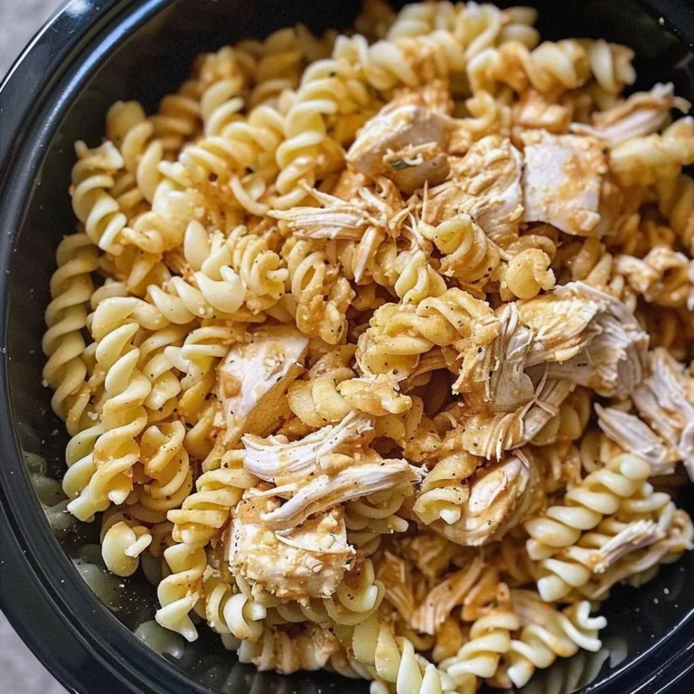Delicious Garlic Parmesan Chicken Pasta served with fresh herbs