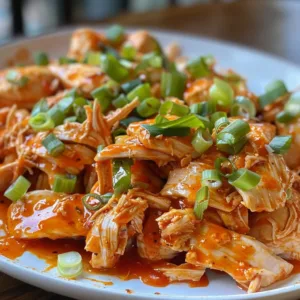 Healthy Slow Cooker Buffalo Chicken Recipe 1 Healthy slow cooker buffalo chicken dish served with fresh vegetables