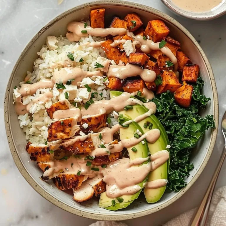 Roasted chicken rice bowls served with sweet potatoes and fresh greens