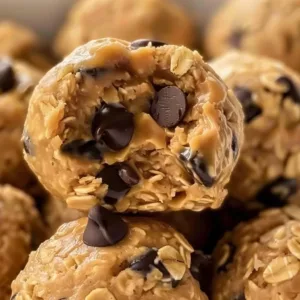Simple Energy Balls Recipe 1 Homemade energy balls with nuts and dried fruits in a bowl