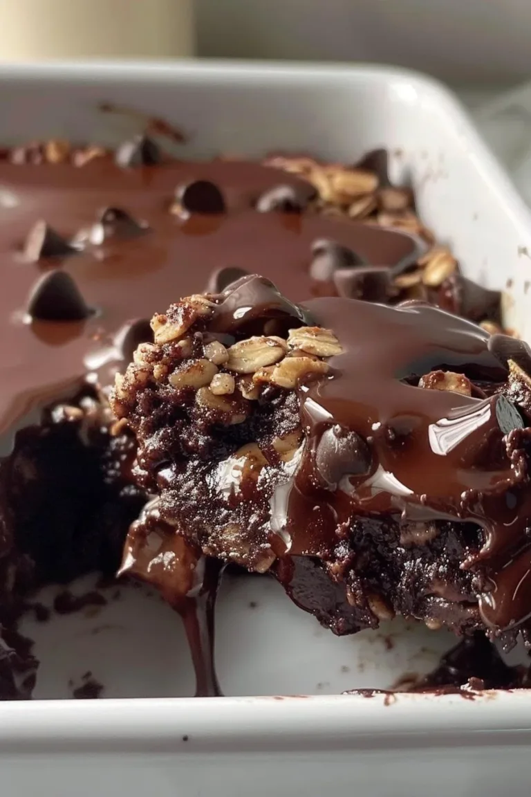 Chocolate brownie baked oatmeal topped with chocolate chips and nuts